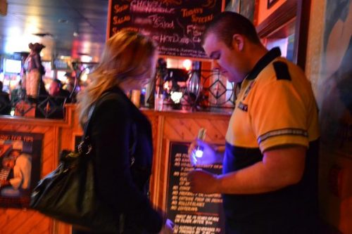 security guard checking at the door